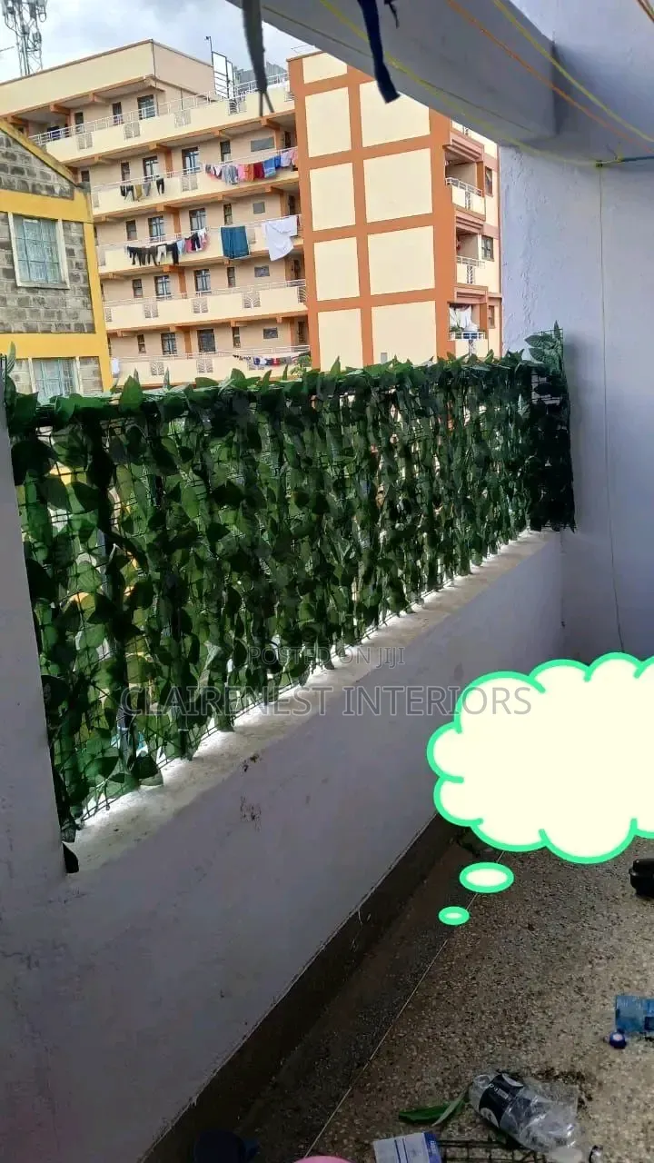 Add Removable-Looking Style to Your Outdoor Area With Artificial Fence
