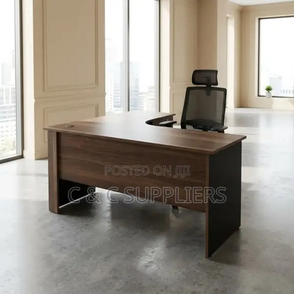 Curved Brown Study Desk With Drawers.