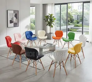 Dining Chairs; Leather Padded Eames Butterfly Dining Chairs