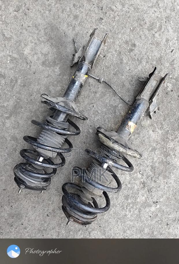 Nissan B15 Front Complete Shock - main view