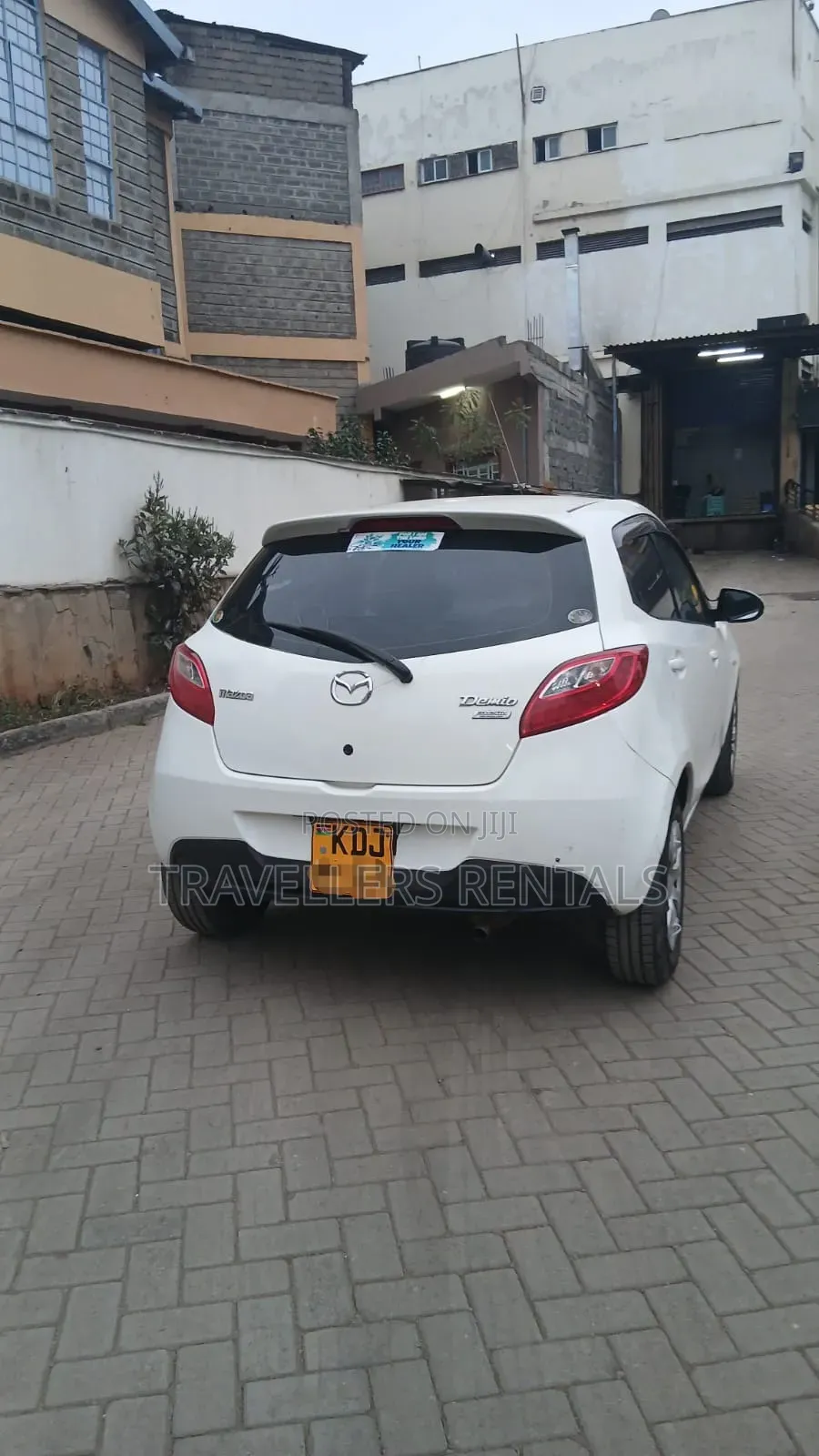MazdaDemio - Pearl White