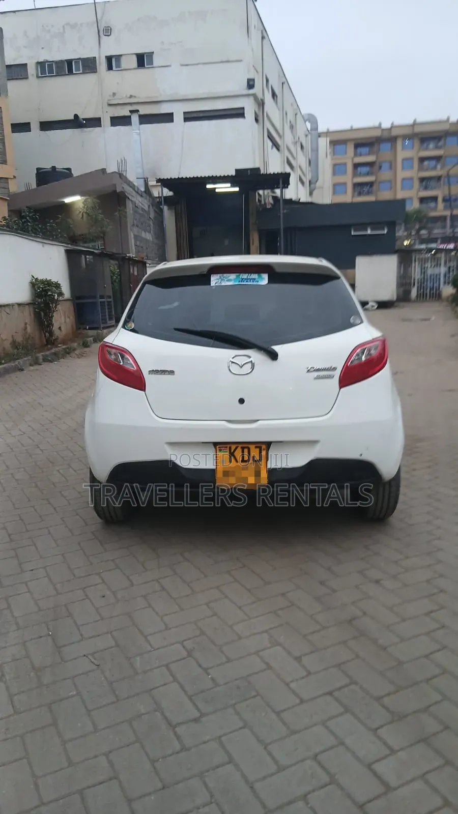 MazdaDemio - Pearl White