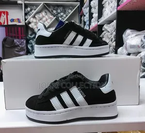 Kids Black and White Adidas Campus Sneakers