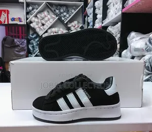 Kids Black and White Adidas Campus Sneakers