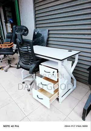 Black Mesh Office Chair and Office Table