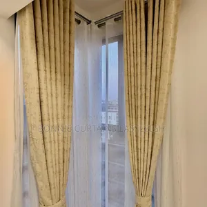 Cream Light Curtains and Off White Sheers for Living Rooms