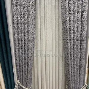 Grey Curtains and Cream Sheers With Rings