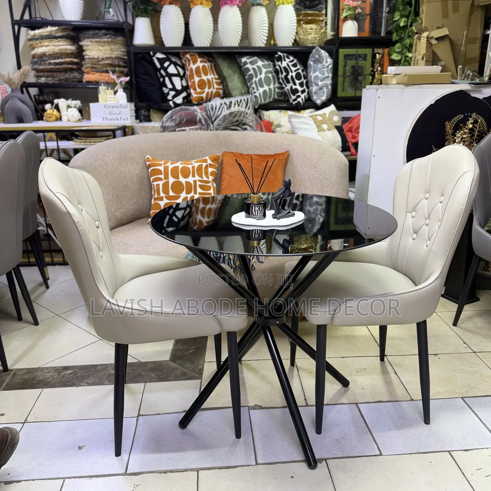 Black Round Tempered Glass Table 2 Beige Leather Chairs