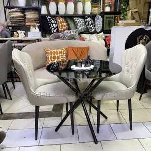 Black Round Tempered Glass Table 2 Beige Leather Chairs