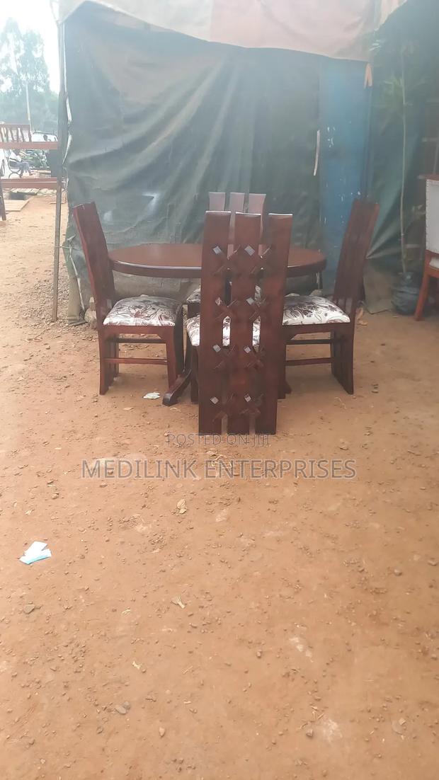 Ova Walnut Six Seater Dinning Table Set