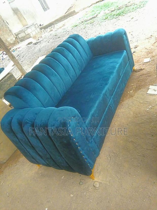 3 Seater Teal Studded Scallop Sofa: Pay on Delivery
