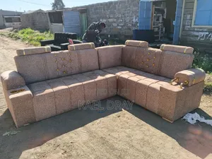 L-Shaped Corner Sofa With Adjustable Headrests, Gold Trim Cup Holder