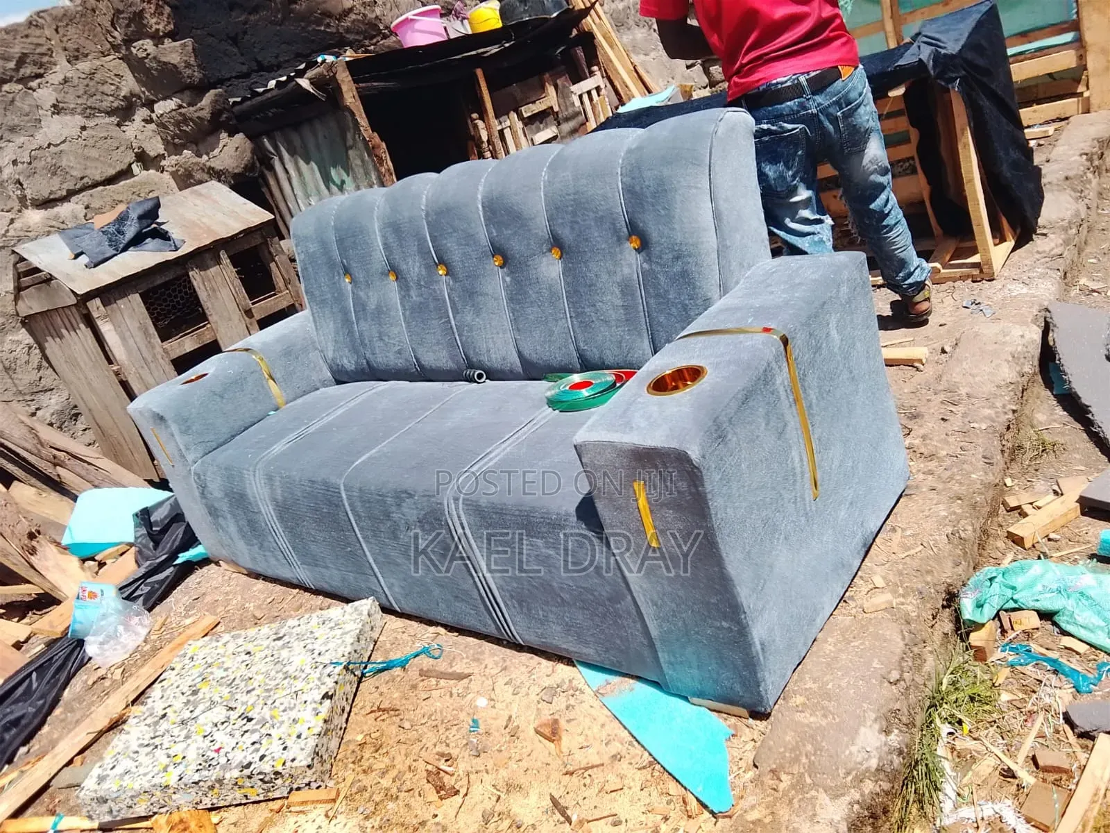 Cream Channel-Tufted Sofa With Gold Button Detailing