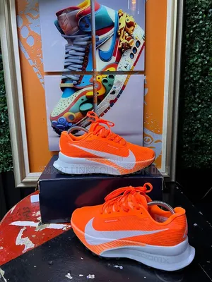 Nike ACG ZoomX Ultrafly “Hyper Crimson Orange”.