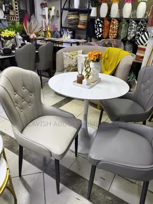 Luxurious Beige Leather Dining Chair – Black Metallic Legs