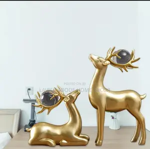 Pair of Decorative Deer Sculptures With Crystal Balls – 2Pc Set