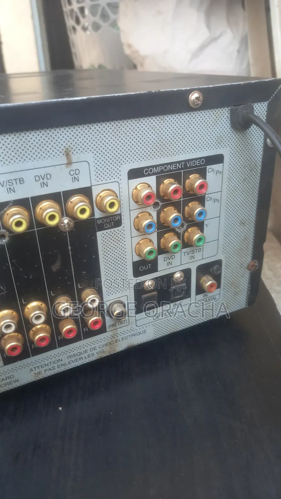 LG Receiver With Its Powered Subwoofer and One Tallboy Speaker