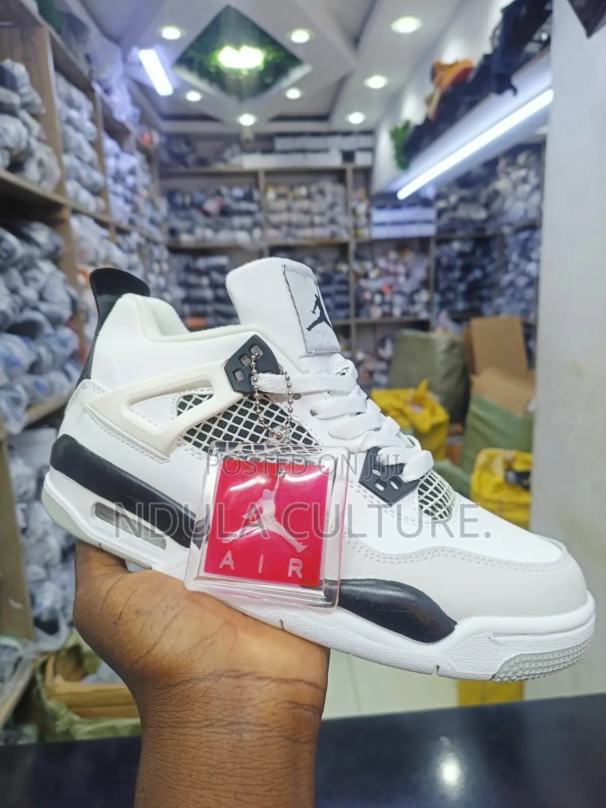 Jordan 4 White Cement