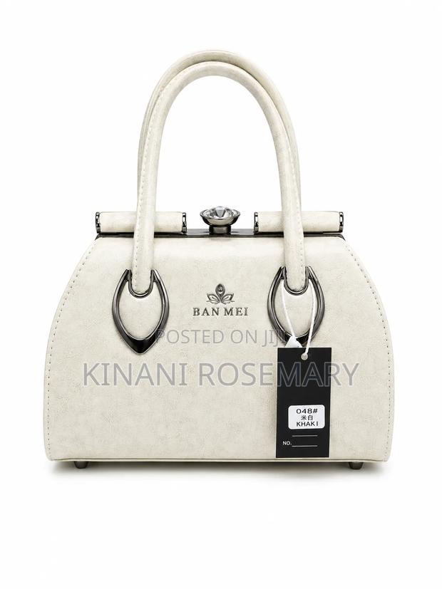 Elegant Structured Top Handle Handbag – Cream