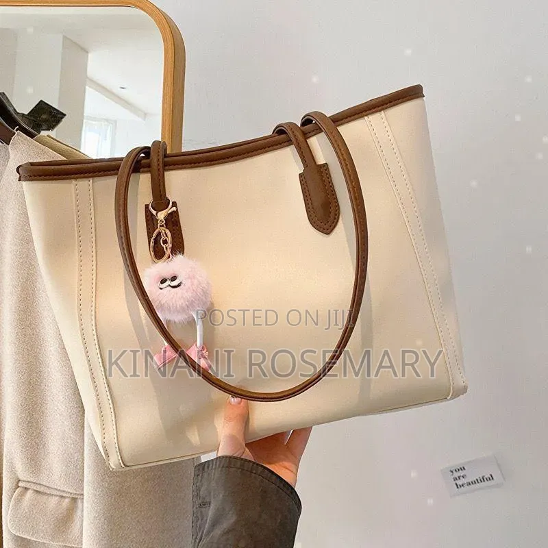 Leather
Cream/Beige With Brown
Style Bag