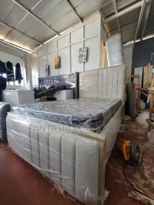 Beige 4 by 6 Chesterfield Bed
