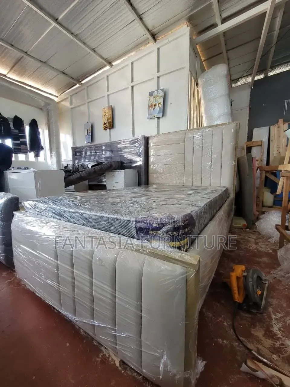 Beige 4 by 6 Chesterfield Bed
