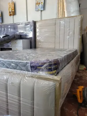 Beige 4 by 6 Chesterfield Bed