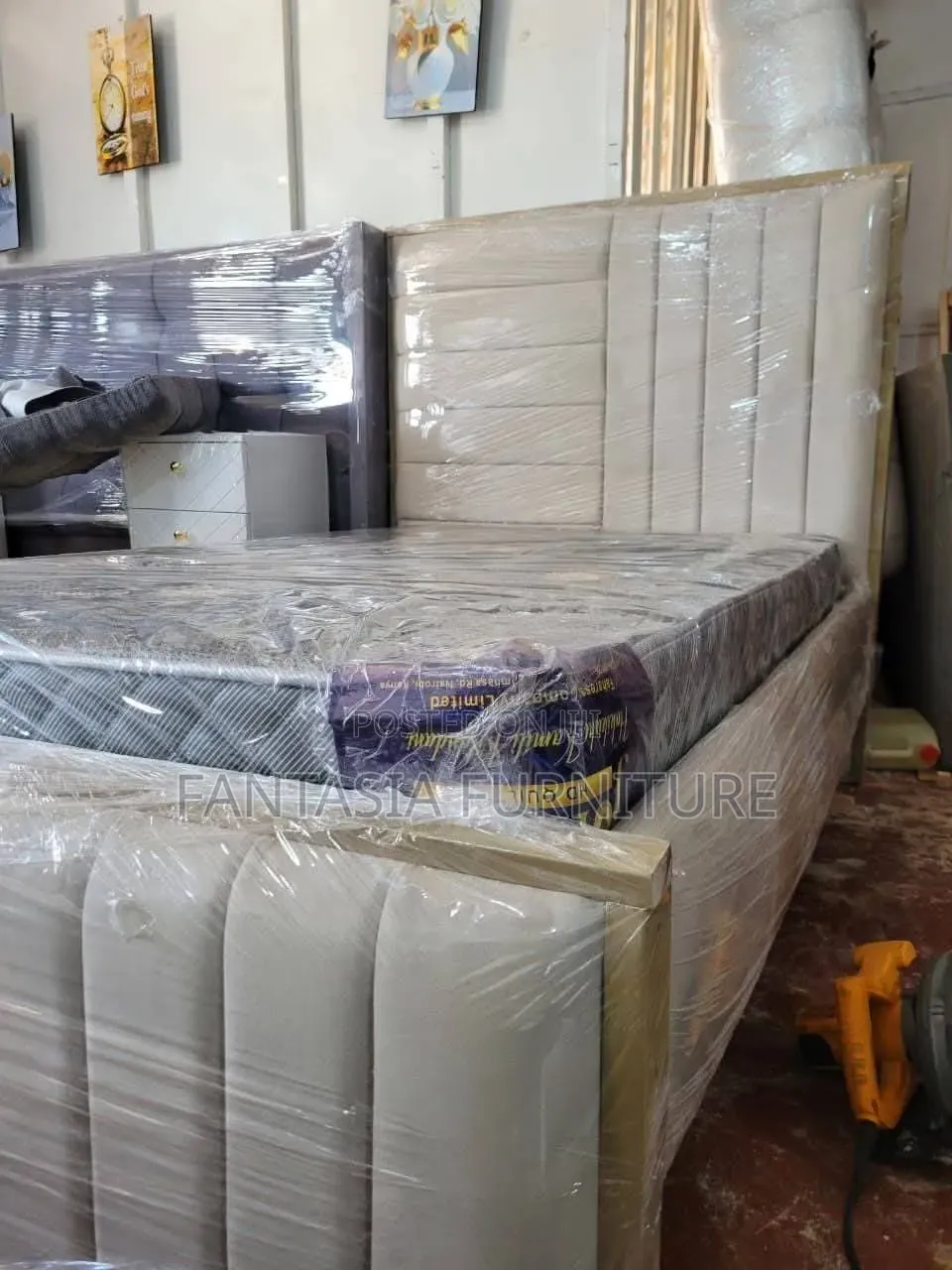 Beige 4 by 6 Chesterfield Bed