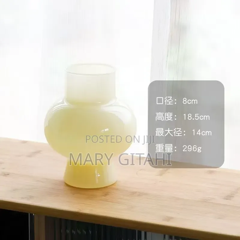 Fancy Shaped *New
Glass Flower Vase