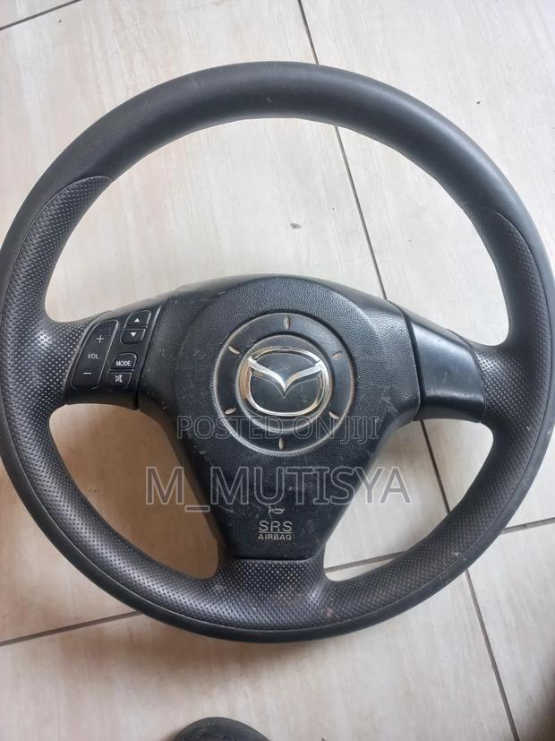 Mazda Axela Complete Steering Wheel With SRS Airbag