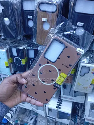 Brown Samsung Galaxy A55 MagSafe Phone Case With Small Black Hearts