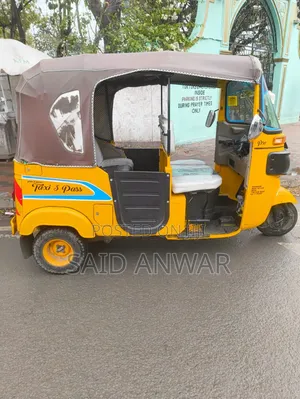 Bajaj RE 2023 Yellow