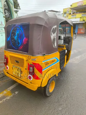Bajaj RE 2023 Yellow