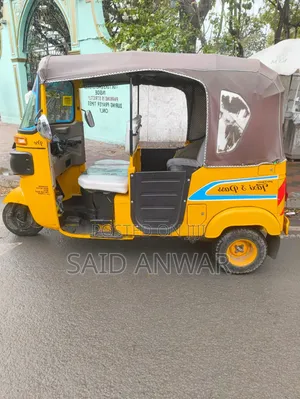 Bajaj RE 2023 Yellow