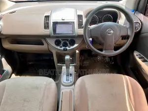 Nissan Note 2010 Maroon