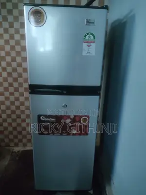Refrigerator for Sale. Used for 4 Months. Free Fridge Guard.