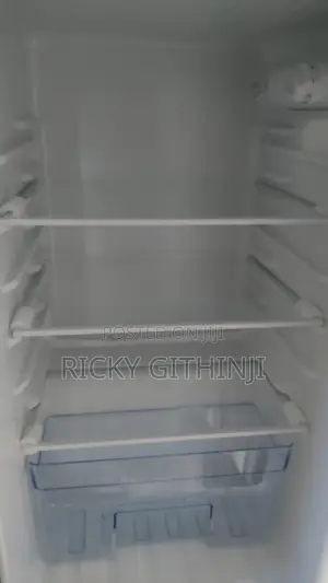 Refrigerator for Sale. Used for 4 Months. Free Fridge Guard.