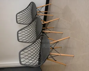 Modern Black Mesh Dining Chairs With Wooden Legs