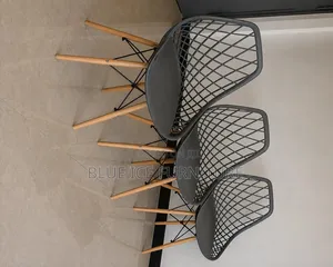 Modern Black Mesh Dining Chairs With Wooden Legs