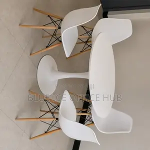 4-Seater Round Dining Table Set With Modern White Chairs