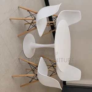 4-Seater Round Dining Table Set With Modern White Chairs