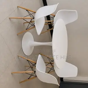 4-Seater Round Dining Table Set With Modern White Chairs