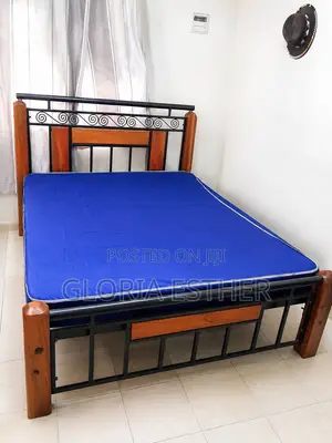 Elegant 5*6 Wooden and Metal Bed Frame. Strong and Durable, in Good Co
