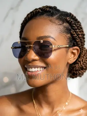 Polarized Gold-Accented Rimless Aviator Sunglasses by Gianni Versace
