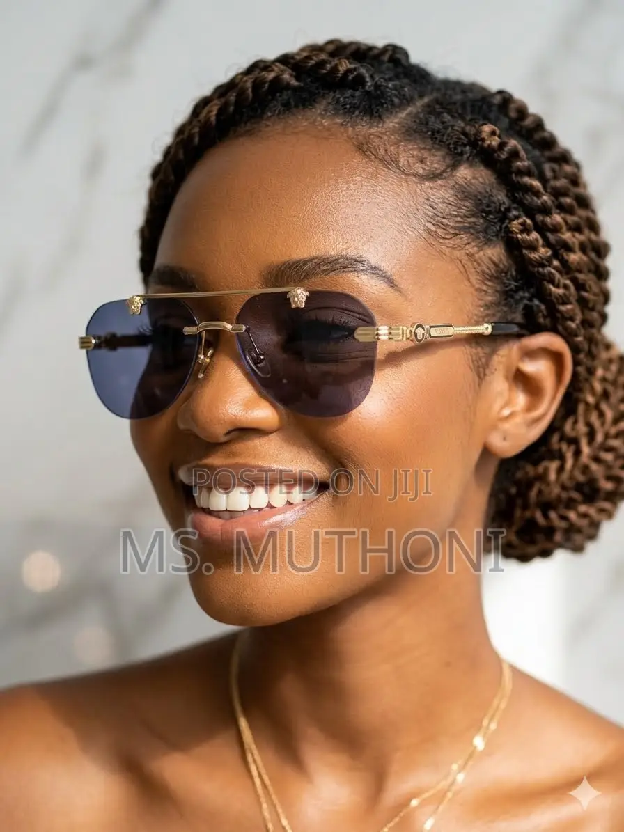 Polarized Gold-Accented Rimless Aviator Sunglasses by Gianni Versace