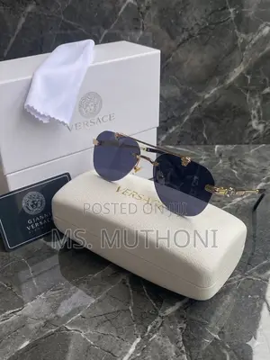 Polarized Gold-Accented Rimless Aviator Sunglasses by Gianni Versace