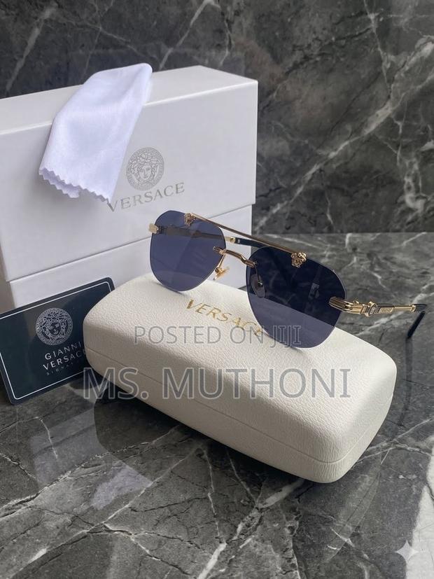 Polarized Gold-Accented Rimless Aviator Sunglasses by Gianni Versace