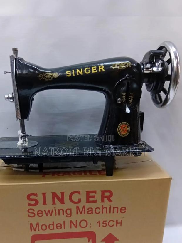Singer Sewing Machine - thumbnail 2