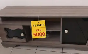 A TV Stand and Armchair