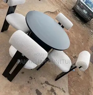 4 Seater Round Black Dining Set With Boucle Chairs
